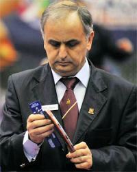 Umpire checking the racket