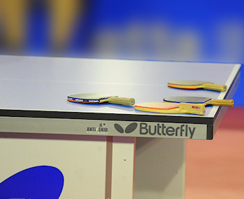 Leave racket on the table during intervals