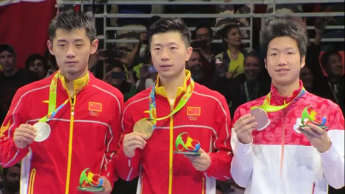 2016 Olympic Games Men's Singles Event medalists - Zhang Jike, Ma Long and Jun Mizutani