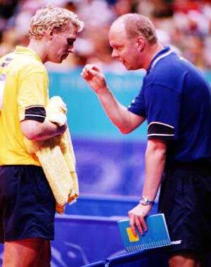 Coach giving advice in table tennis
