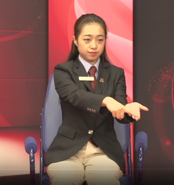 Umpires hand signal for ball resting on the fingers